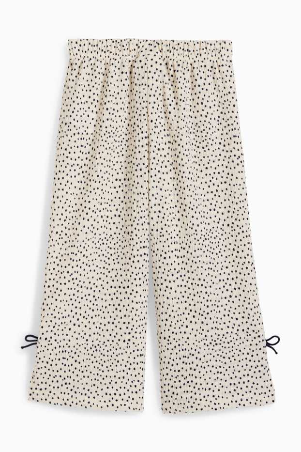 Kinderen: meisjes - Jersey broek - met stippen - met structuur - crème wit