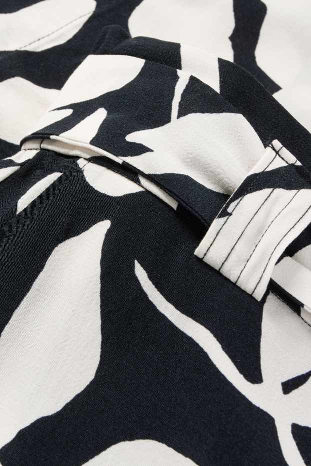Donna - Pantaloni di stoffa - vita alta - gamba ampia - a fiori - blu scuro / bianco crema