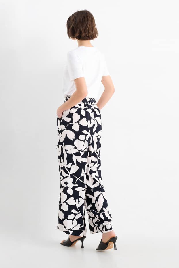 Donna - Pantaloni di stoffa - vita alta - gamba ampia - a fiori - blu scuro / bianco crema