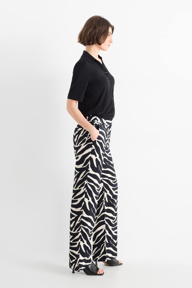 Donna - Pantaloni di stoffa - vita alta - gamba ampia - fantasia - nero / beige