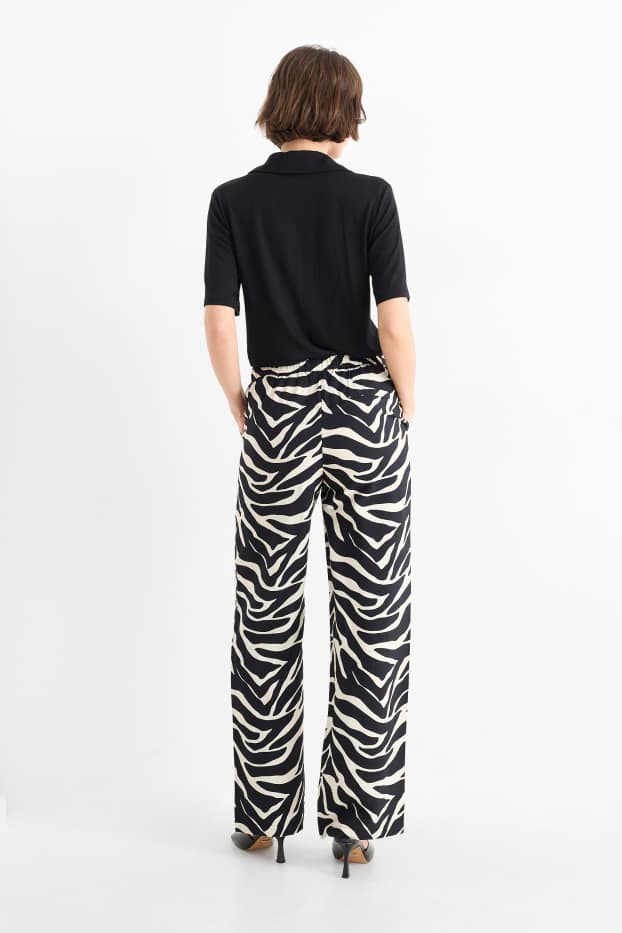 Donna - Pantaloni di stoffa - vita alta - gamba ampia - fantasia - nero / beige