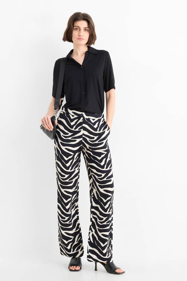 Donna - Pantaloni di stoffa - vita alta - gamba ampia - fantasia - nero / beige
