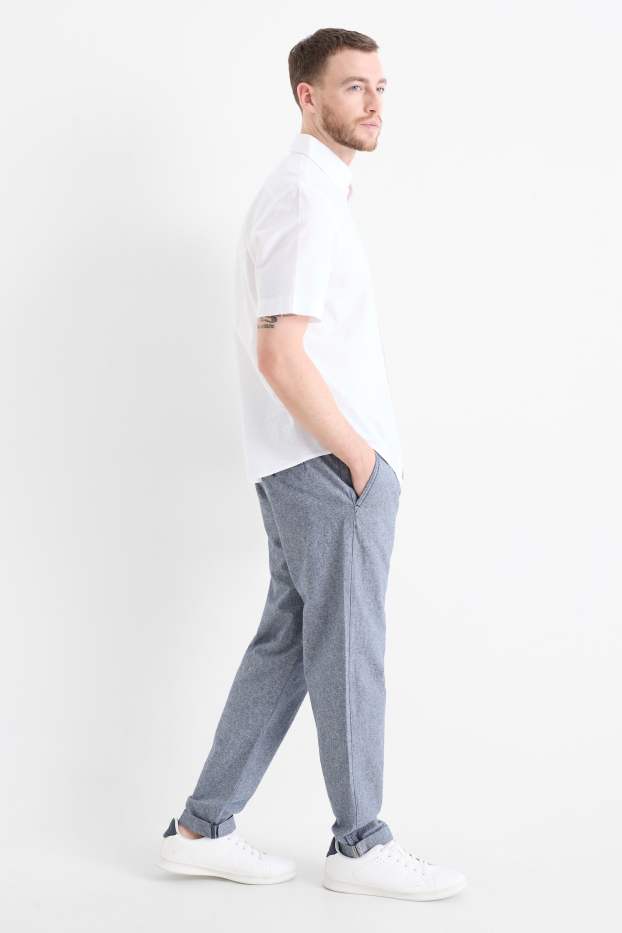 Uomo - Pantaloni chino con componente di lino - tapered fit - blu melange