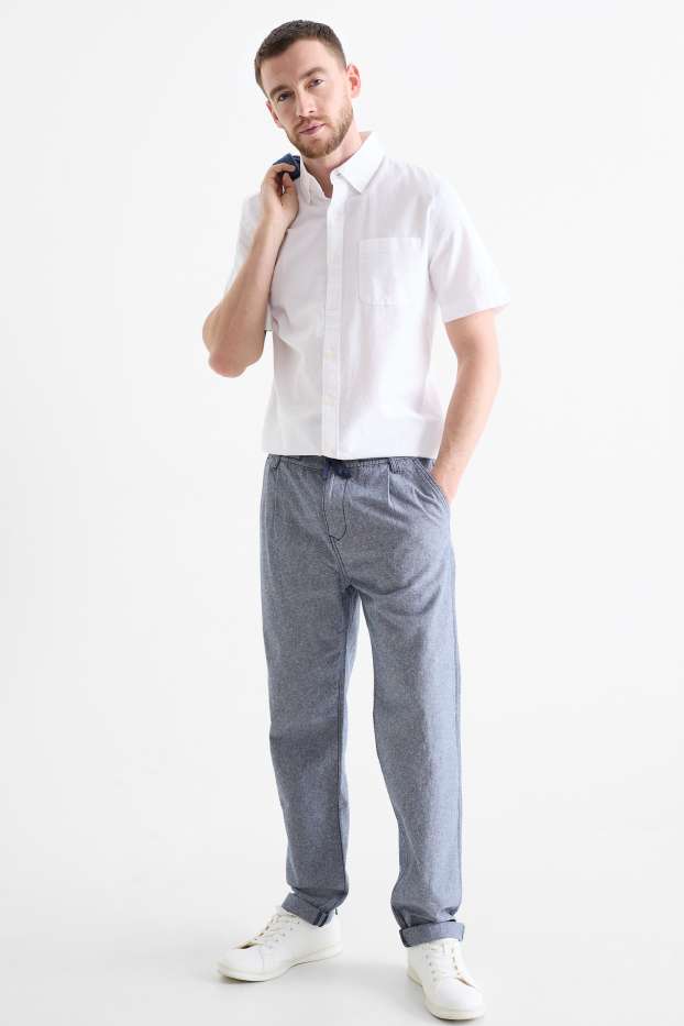 Uomo - Pantaloni chino con componente di lino - tapered fit - blu melange