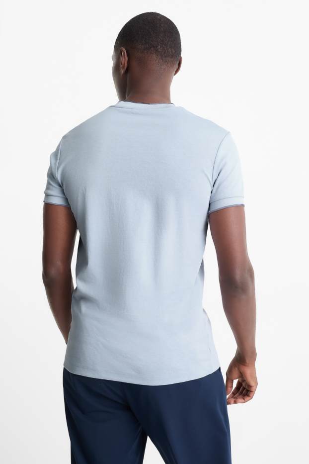 Heren - T-shirt - slim fit - lichtblauw
