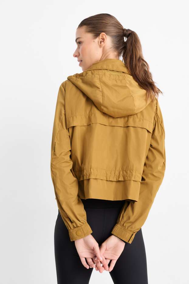 Damen - Jacke mit Kapuze - wasserabweisend - senfgelb
