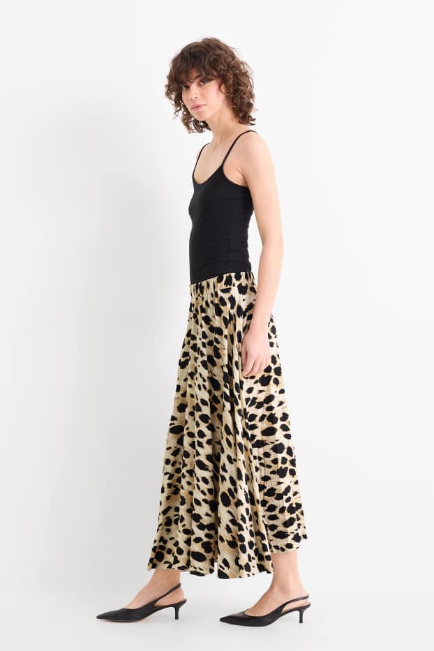 Dona - Faldilla - estampat de lleopard - beix