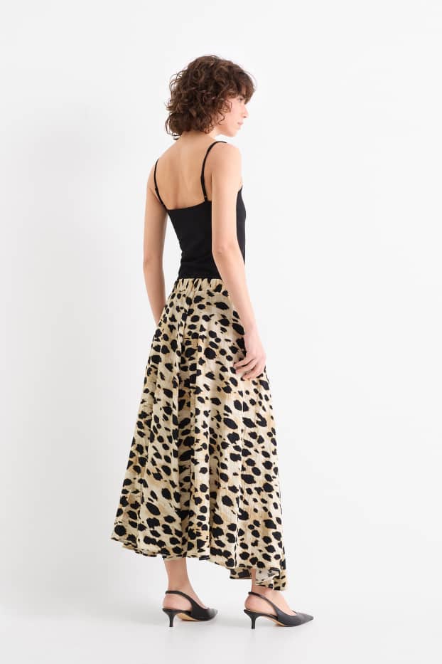 Dona - Faldilla - estampat de lleopard - beix