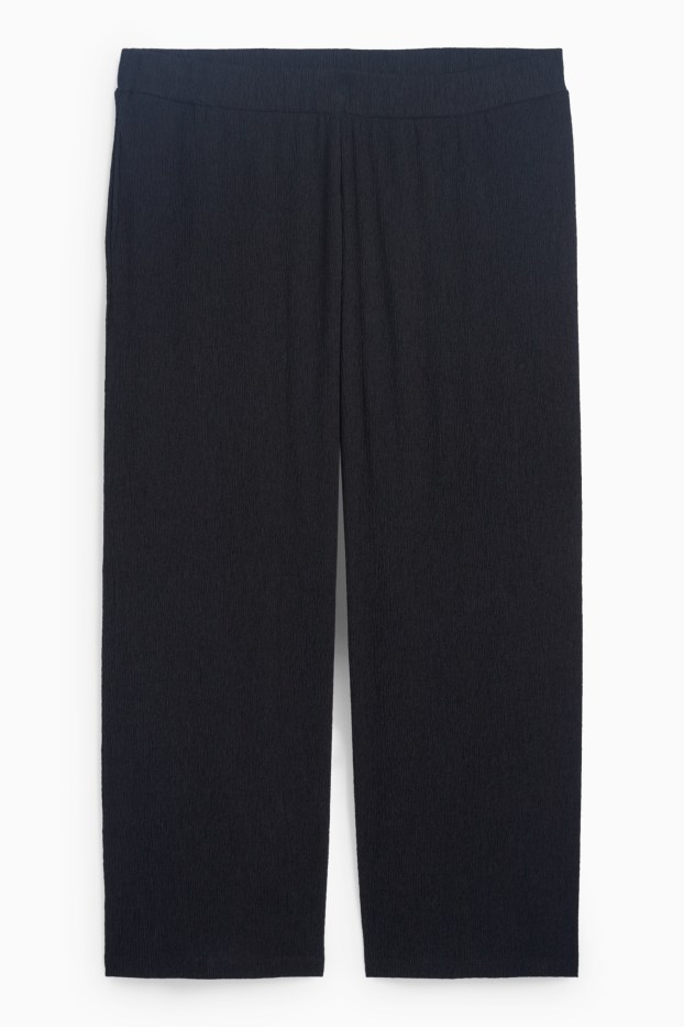 Dona - Pantalons de punt - mid waist - wide leg - texturats - negre