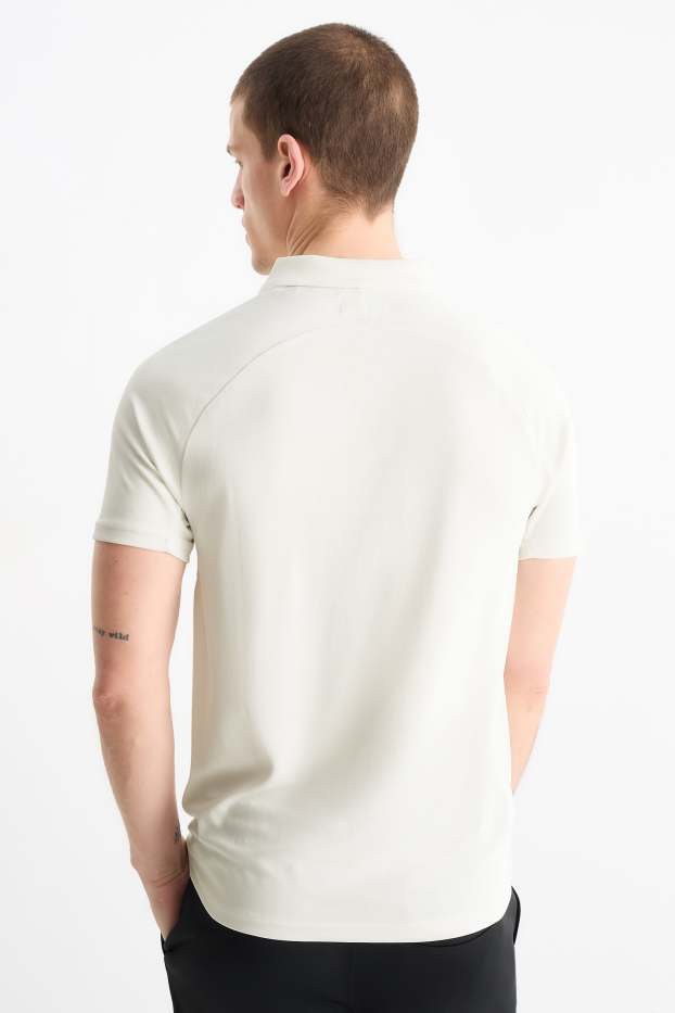 Home - Polo tècnic - blanc trencat