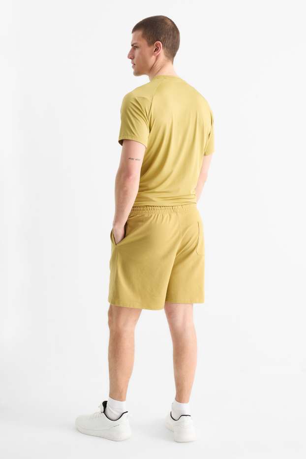 Hommes - Short en molleton de sport - jaune moutarde