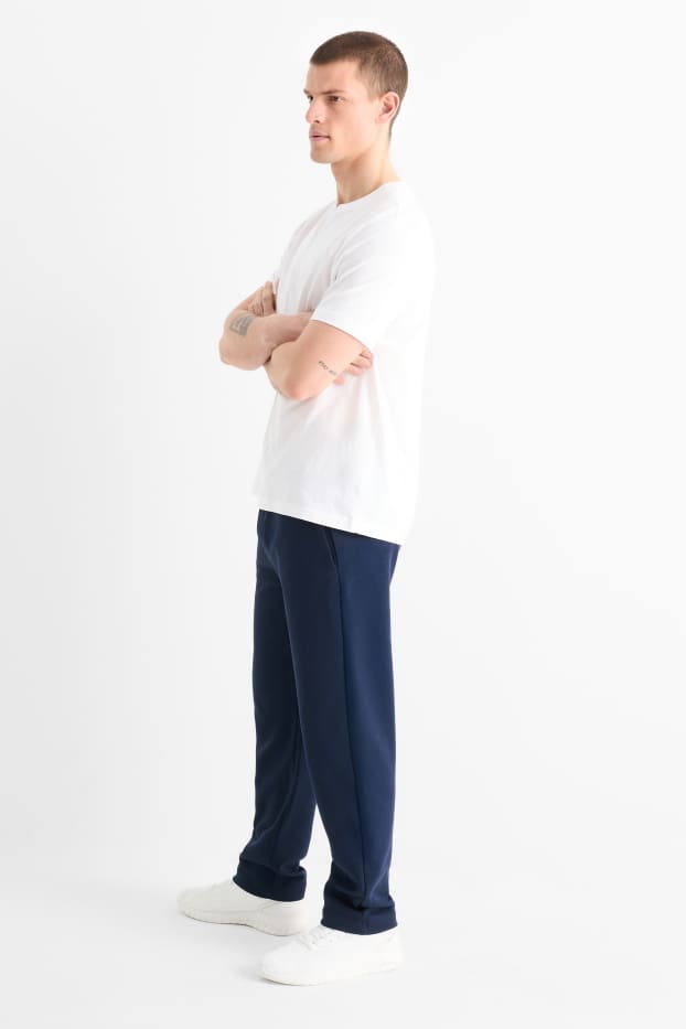 Uomo - Pantaloni sportivi tecnici - blu scuro