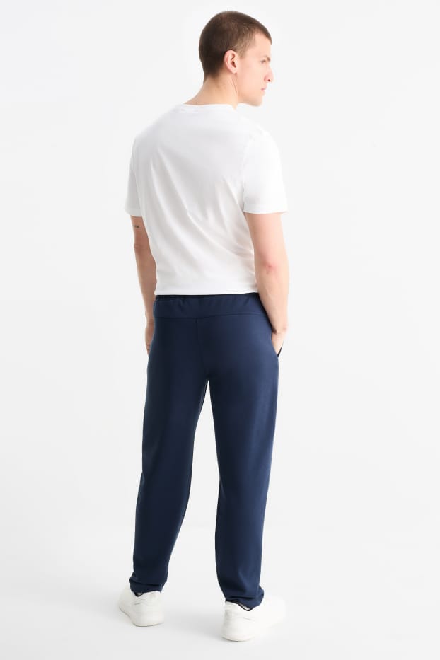 Uomo - Pantaloni sportivi tecnici - blu scuro