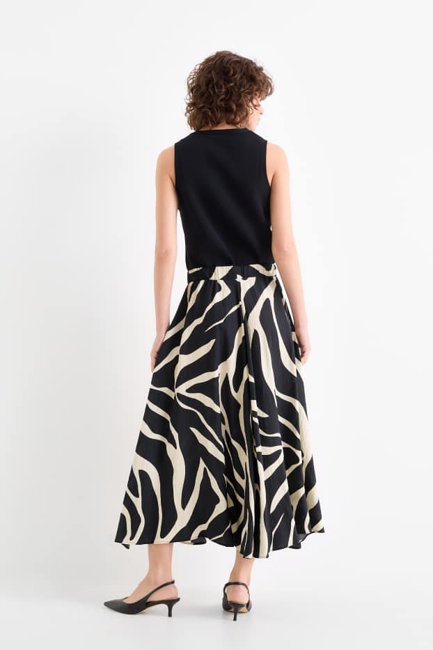 Dona - Faldilla - estampada - negre/beix