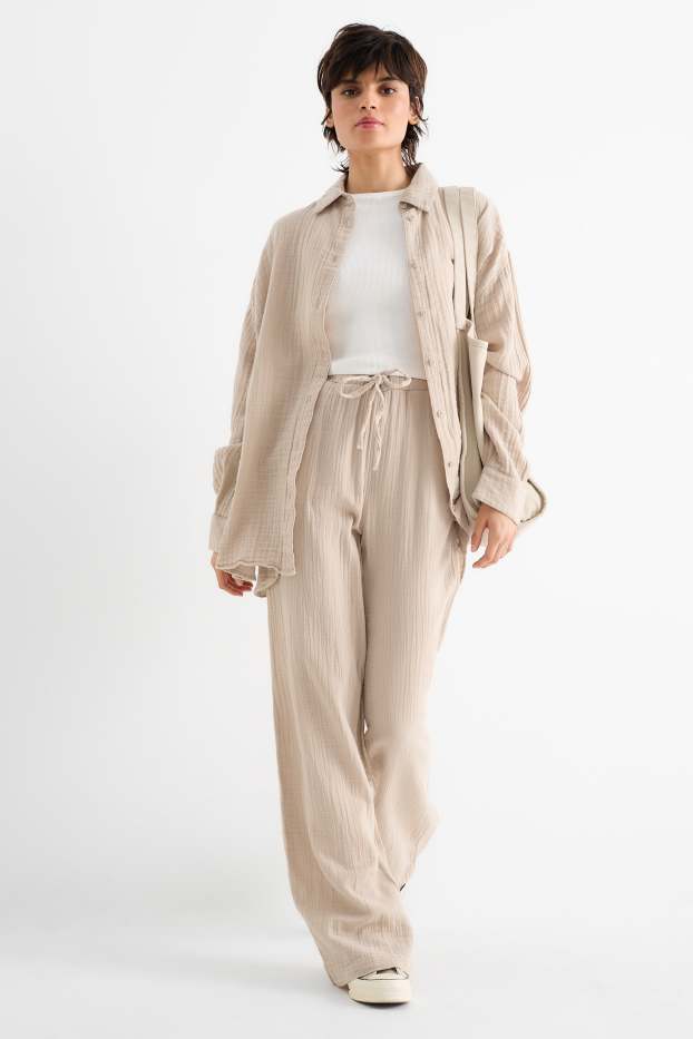 Donna - Pantaloni - vita media - gamba ampia - beige chiaro