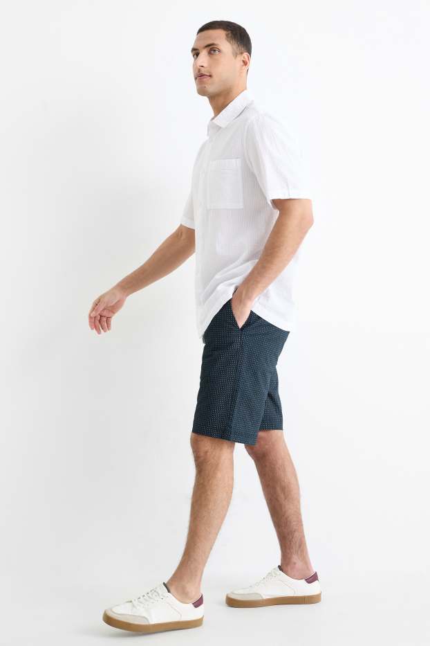Home - Pantalons curts - Flex - estampat minimalista - blau fosc