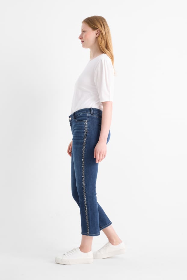 Dames - Korte bootcut jeans met strass steentjes - mid waist - jeansblauw