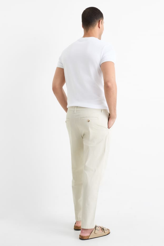 Pánské - Kalhoty chino - tapered fit - krémově bílá