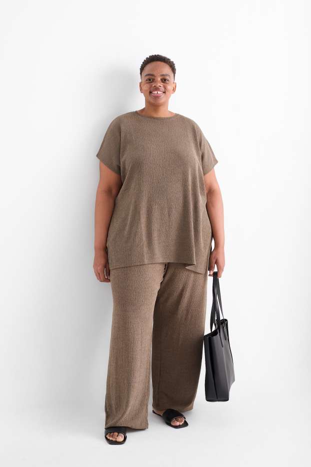 Dona - Pantalons de punt - mid waist - wide leg - texturats - marró