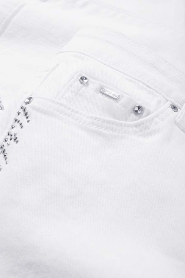 Women - Cropped bootcut jeans with rhinestones - mid-rise waist - white