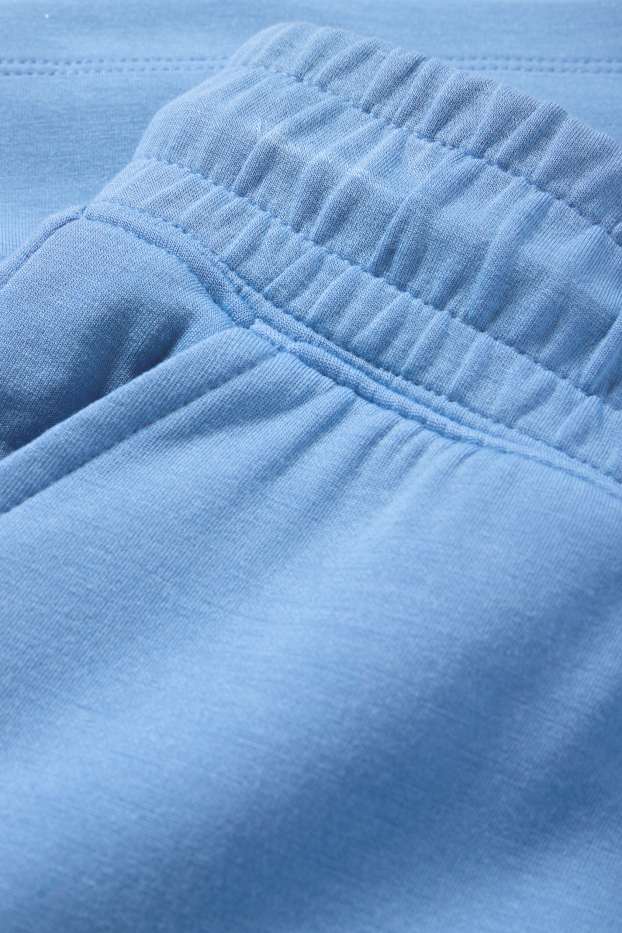 Dona - Pantalons curts tècnics - blau clar