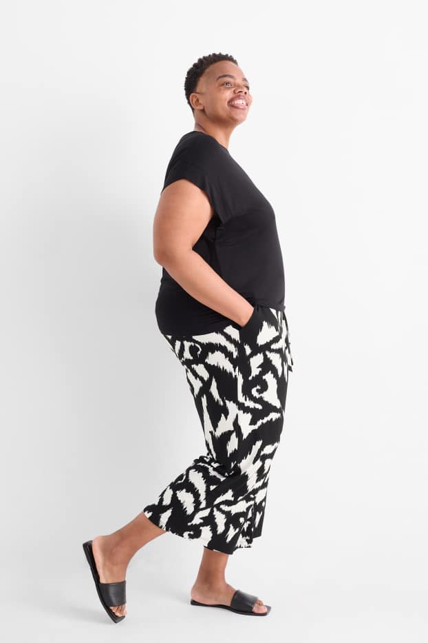 Femei - Pantaloni din jerseu - talie medie - wide leg - cu model - negru / alb