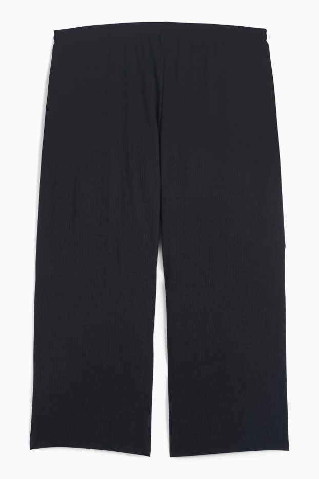 Femmes - Pantalon en jersey - mid waist - wide leg - finition texturée - noir