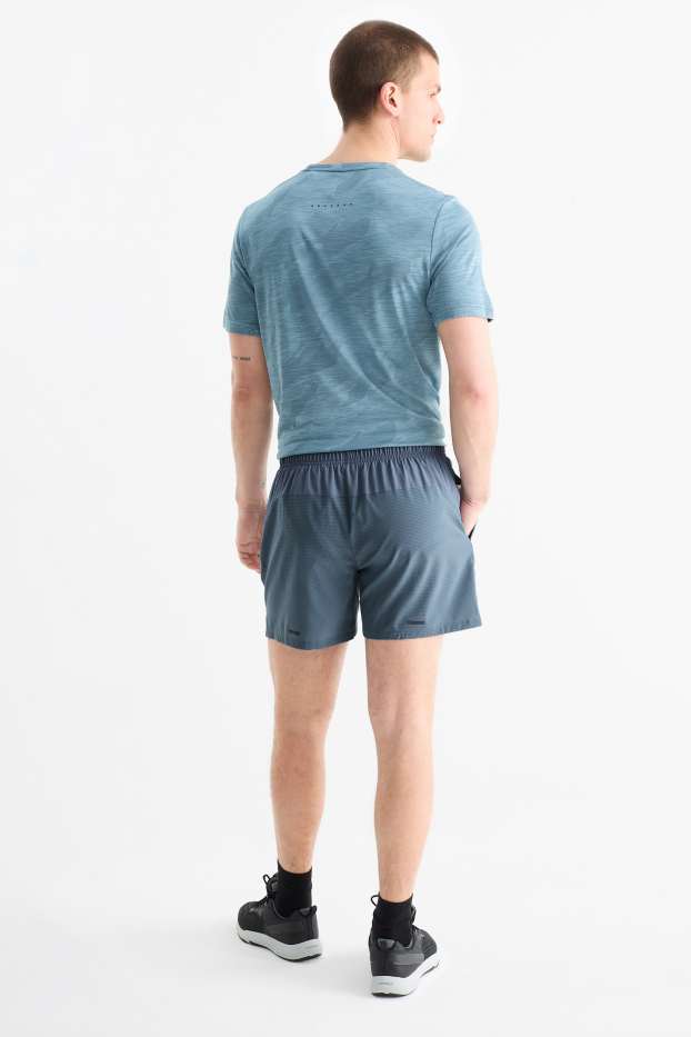 Hommes - Short de sport - 4 Way Stretch - bleu clair