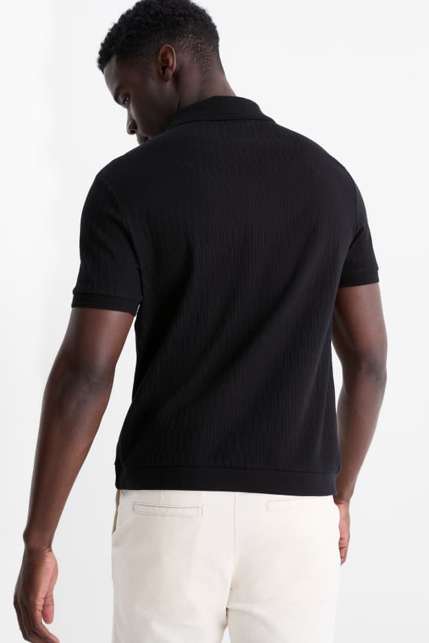 Uomo - Polo - tessuto tramato - nero