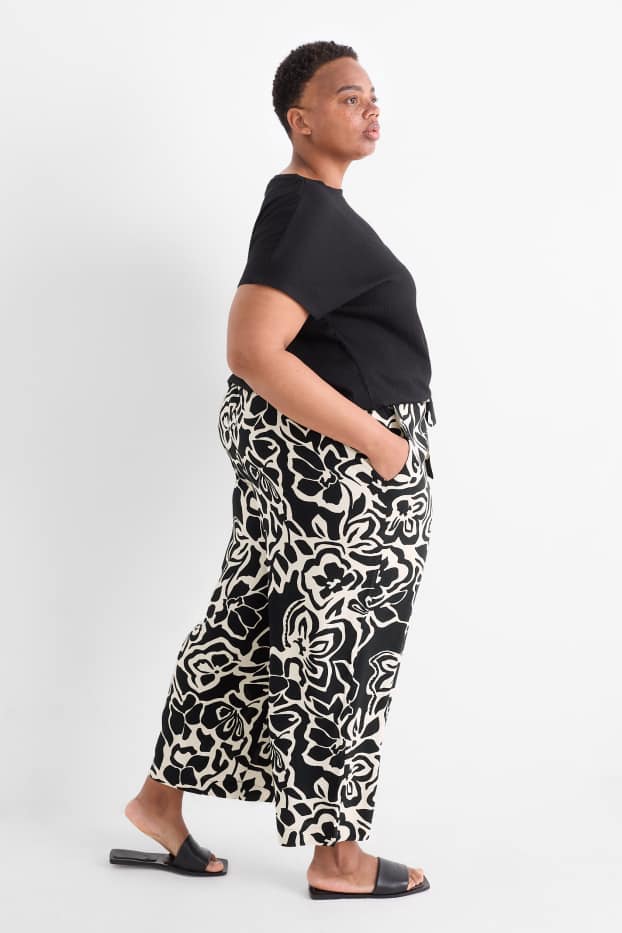 Dames - Pantalon - mid waist - wide leg - gebloemd - met structuur - zwart / beige