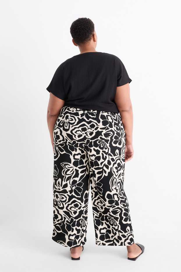 Dames - Pantalon - mid waist - wide leg - gebloemd - met structuur - zwart / beige