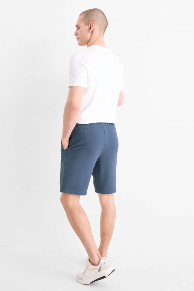Home - Pantalons curts de xandall - blau fosc
