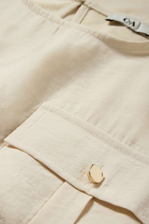 Donna - Blusa smanicata - beige chiaro