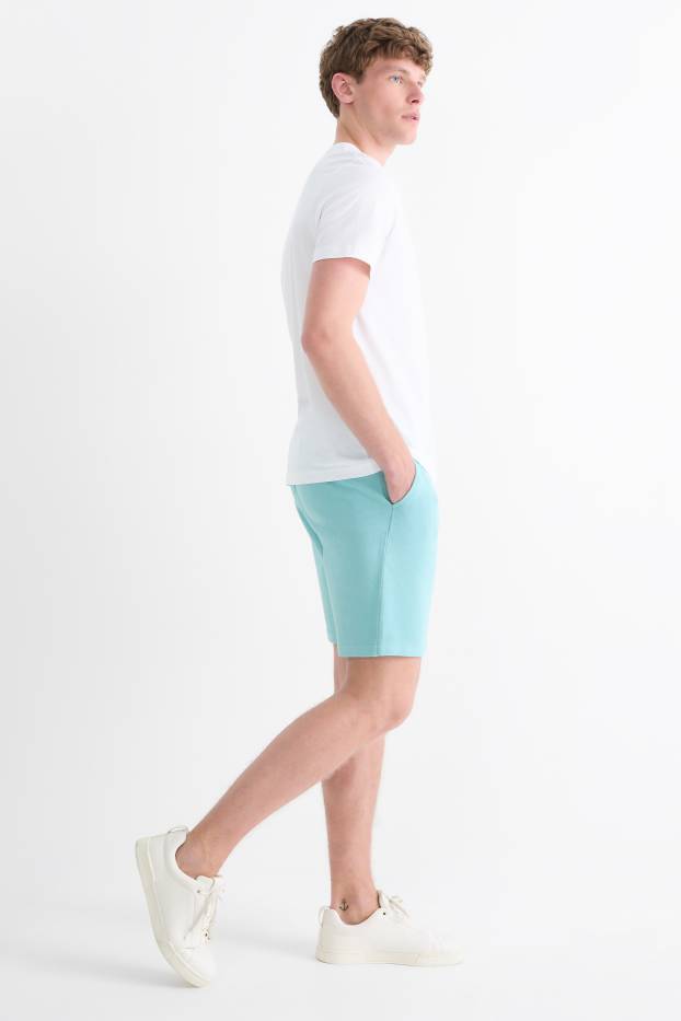 Bărbați - Pantaloni scurți de trening - turcoaz