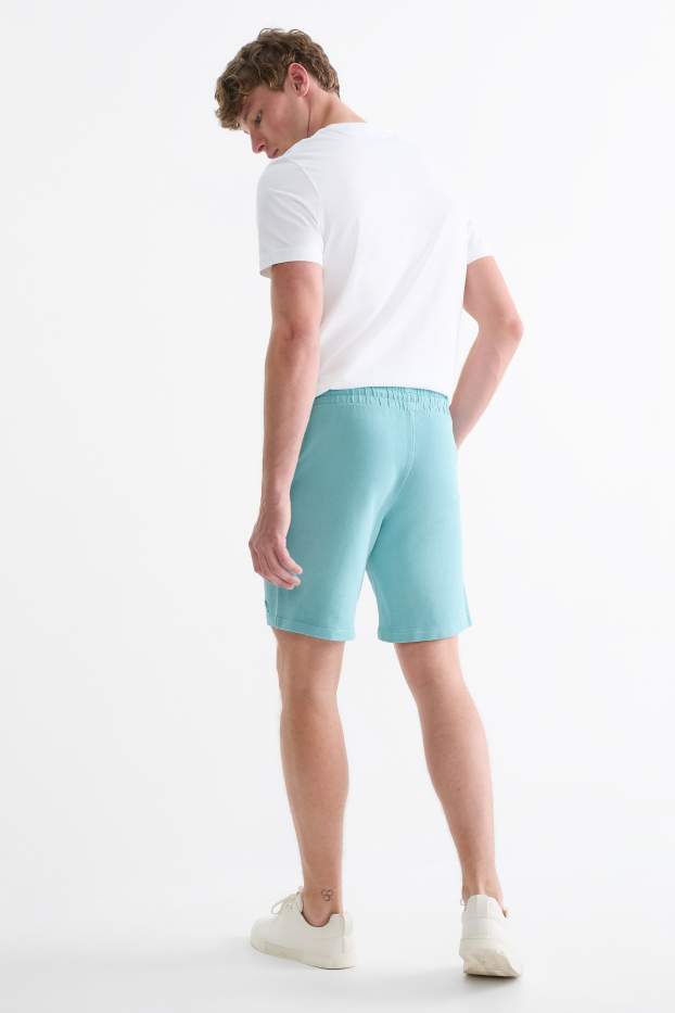 Bărbați - Pantaloni scurți de trening - turcoaz