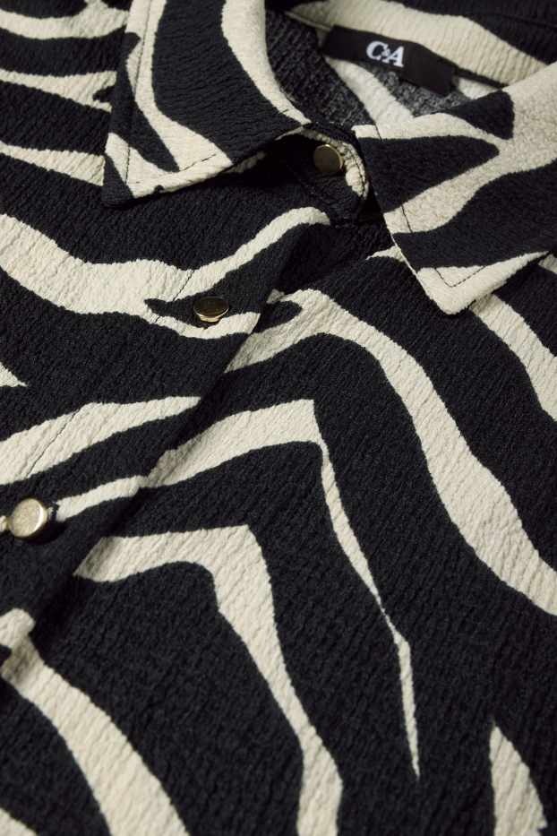 Dona - Brusa sense mànigues - estampada - blanc/negre