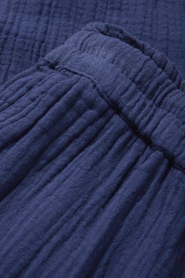 Kobiety - Spodnie materiałowe - wysoki stan - szerokie nogawki - ciemnoniebieski