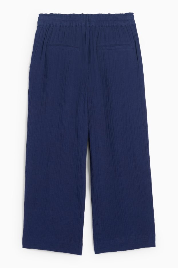 Kobiety - Spodnie materiałowe - wysoki stan - szerokie nogawki - ciemnoniebieski