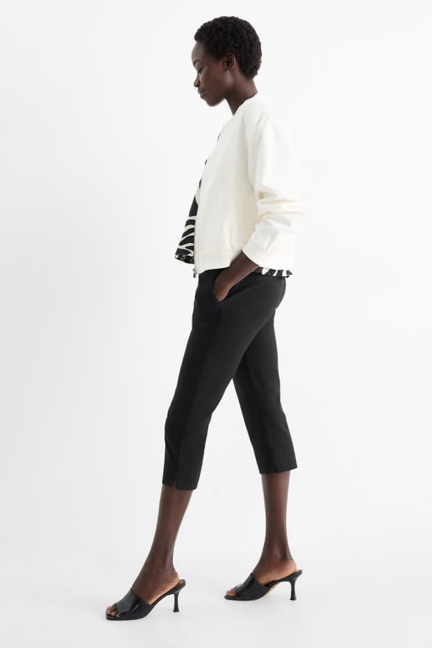 Dames - Capri broek - mid waist - slim fit - zwart