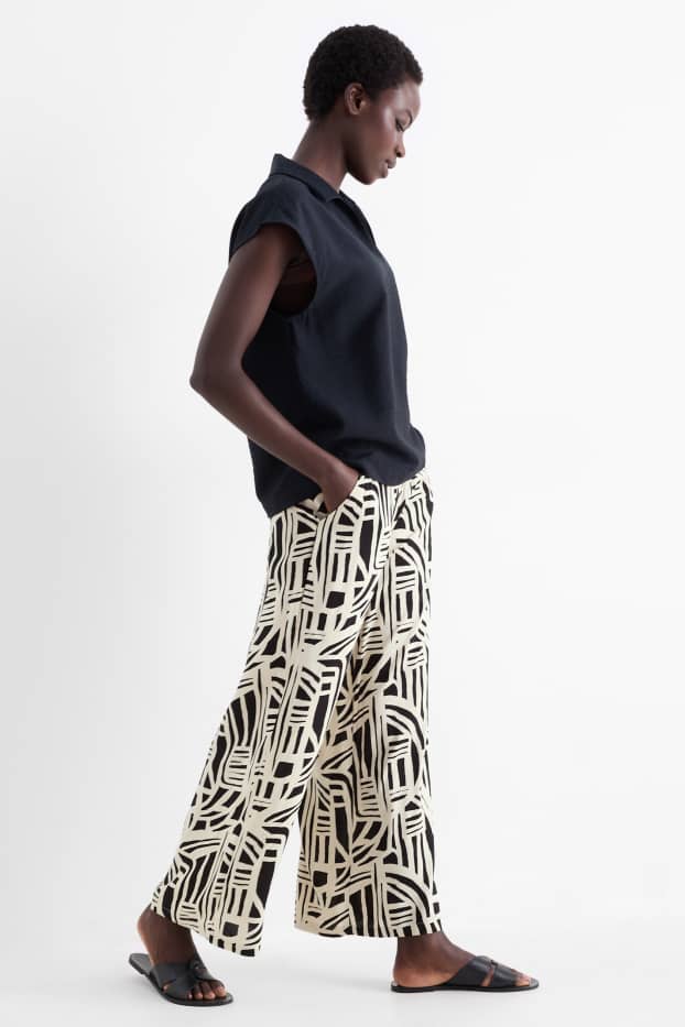 Dames - Pantalon - high waist - wide leg - met patroon - wit / zwart