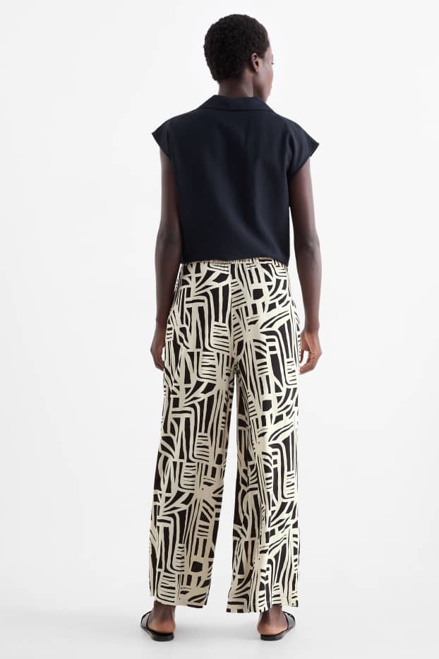 Dames - Pantalon - high waist - wide leg - met patroon - wit / zwart