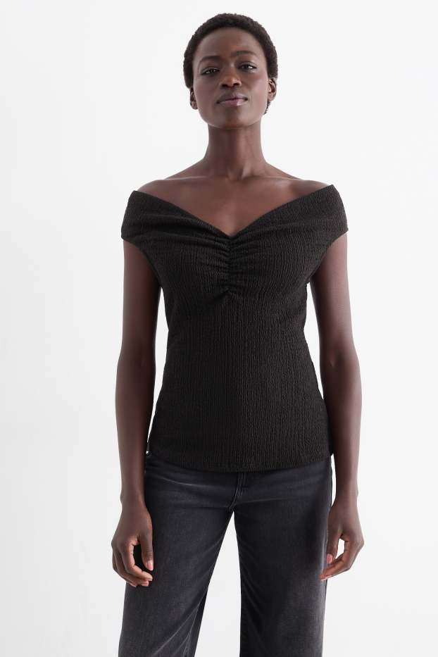 Dona - Samarreta de mànigues curtes - texturada - negre