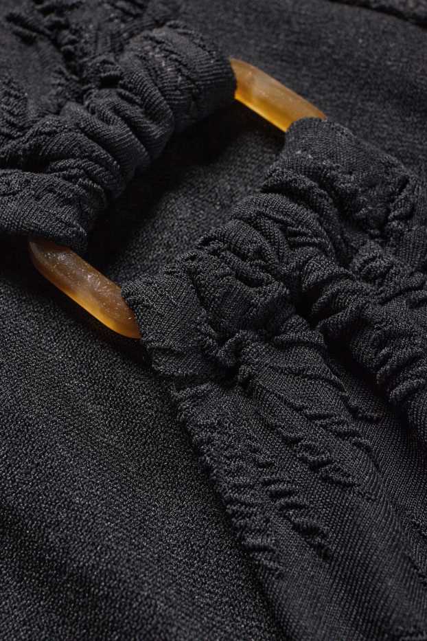 Donna - Slip bikini - vita media - LYCRA® XTRA LIFE™ - tessuto tramato - nero
