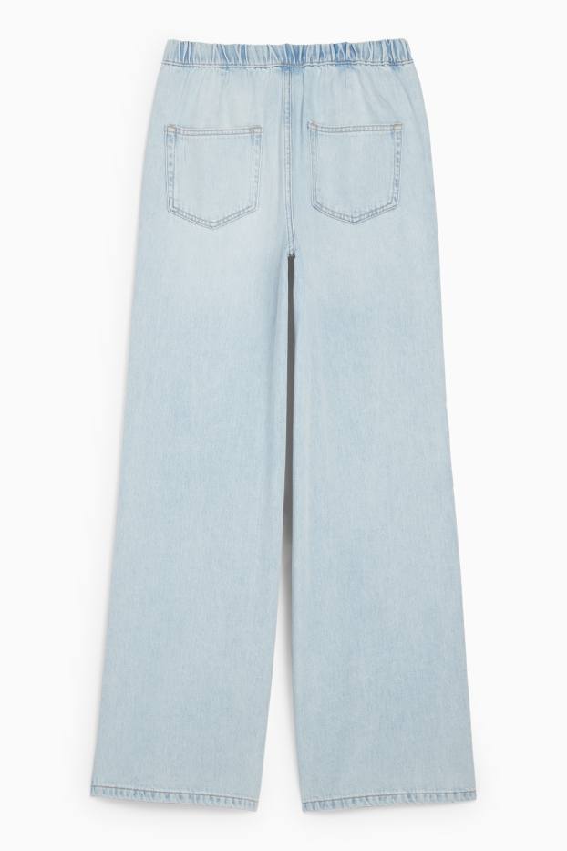 Dona - Wide leg jeans - mid waist - texà blau clar