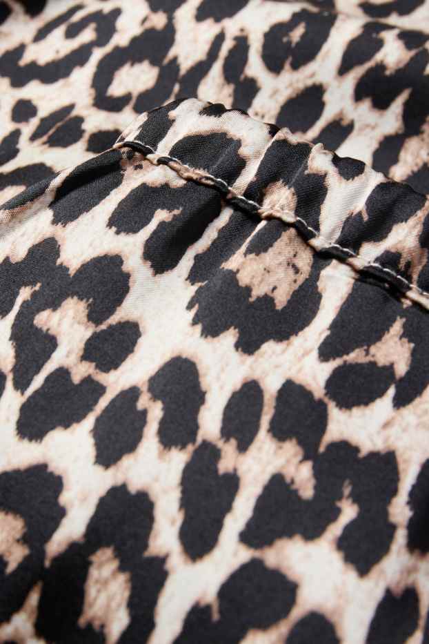 Femmes - Pantalon en toile - high waist - jambes larges - imprimé léopard - noir / beige