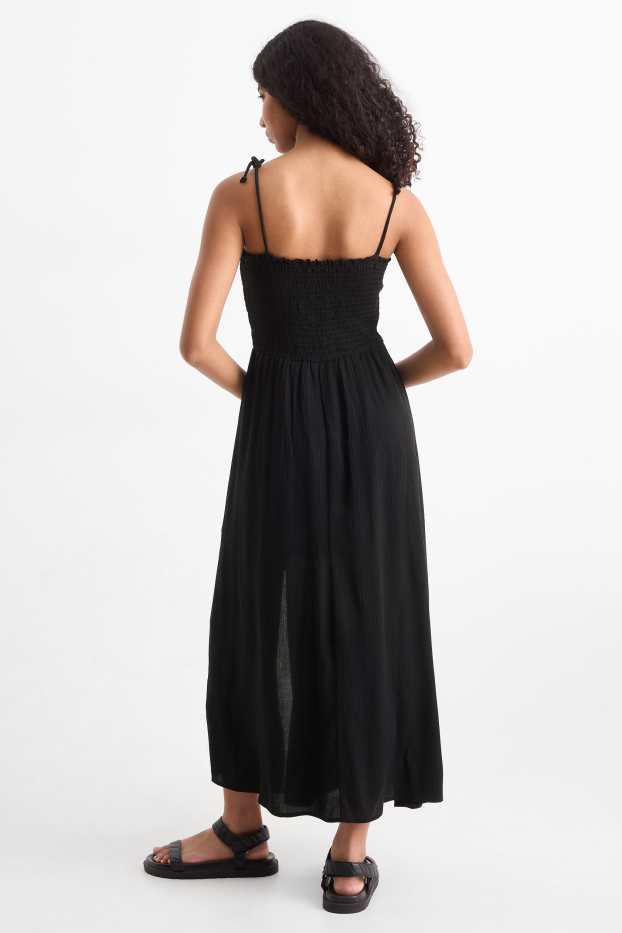 Femmes - Robe de coupe évasée - smockée - noir