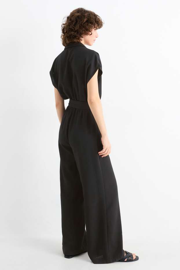 Dames - Jumpsuit met riem - zwart