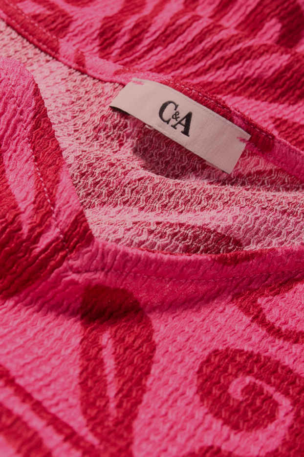 Mujer - Camiseta con escote en pico - regular fit - estampada - fucsia