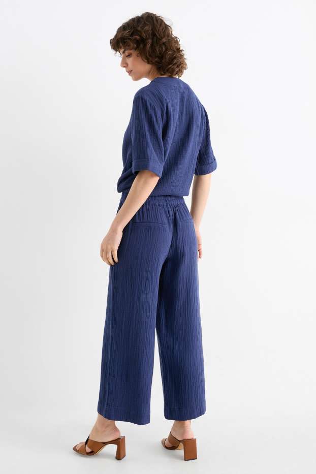 Kobiety - Spodnie materiałowe - wysoki stan - szerokie nogawki - ciemnoniebieski