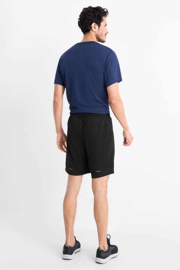 Men - Technical shorts - textured - black